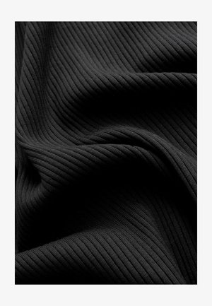 Black ribbed fabric with a smooth texture, featuring vertical grooves and draped folds, creating a layered appearance.