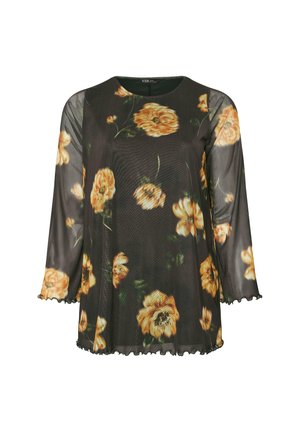 Durchsichtige schwarze Bluse mit Dreiviertelärmeln, die gelbe Blumenmuster, einen gewellten Saum und einen runden Halsausschnitt hat.