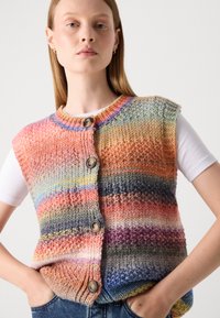 Ärmellose Strickweste mit mehrfarbigen Streifen in rosa, blau und grau. Knopfverschluss mit rundem Ausschnitt und strukturiertem Stoff.