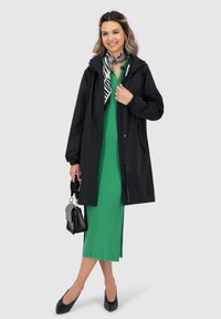 alife & kickin Regenjas - black