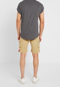 Alpha Industries Šortky - sand
