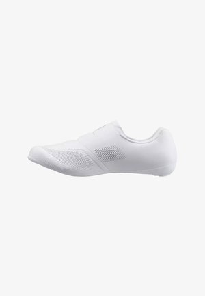 Chaussure de sport blanche profil bas avec panneaux en maille respirante et design sans lacets, vue de côté sur fond blanc.