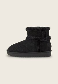 Schwarze Knöchelschuh aus strukturiertem Stoff mit Glitzer, ausgestattet mit einem gefütterten Kunstfellrand, runder Zehenform und einer rutschfesten Gummisohle.