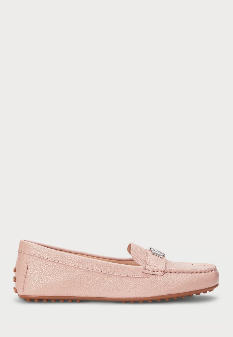 Pink leather loafers with a textured finish, featuring a small decorative hardware accent. Flexible rubber sole with rounded dots for grip.