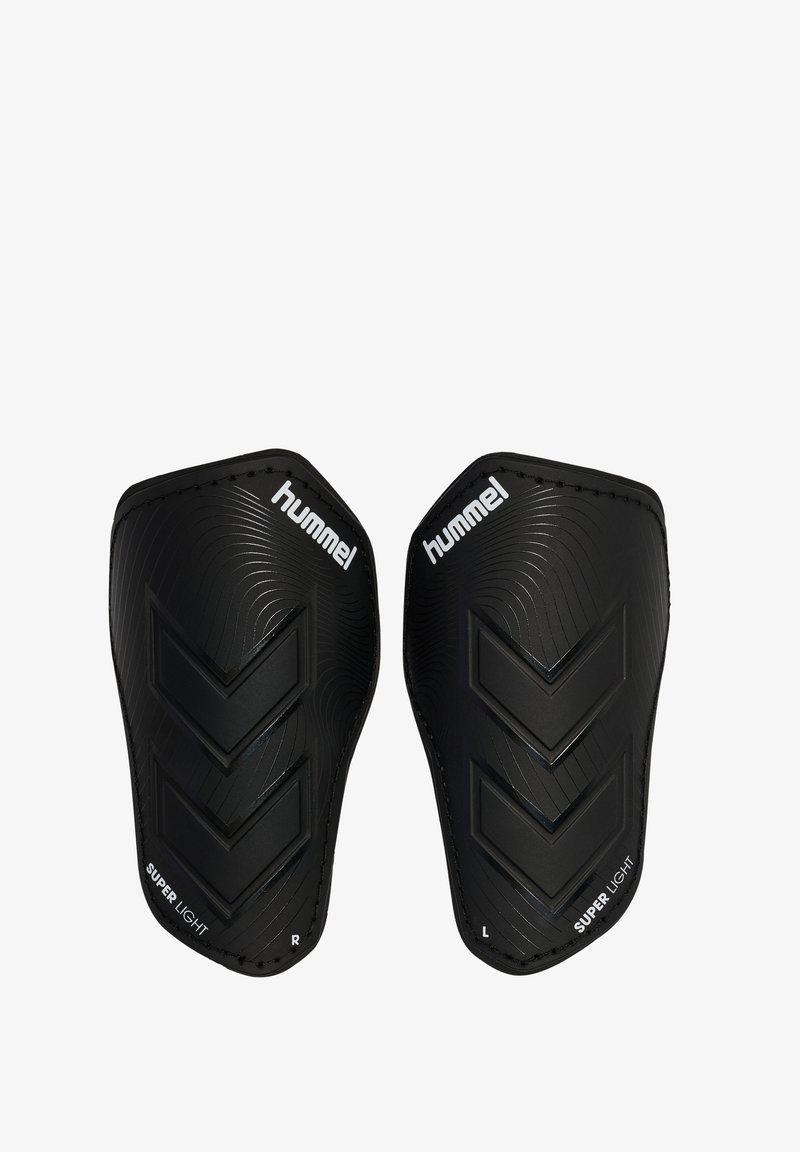 Pair of black Hummel brand shin guards with embossed chevron design and "Super Light" text, labeled left and right.
