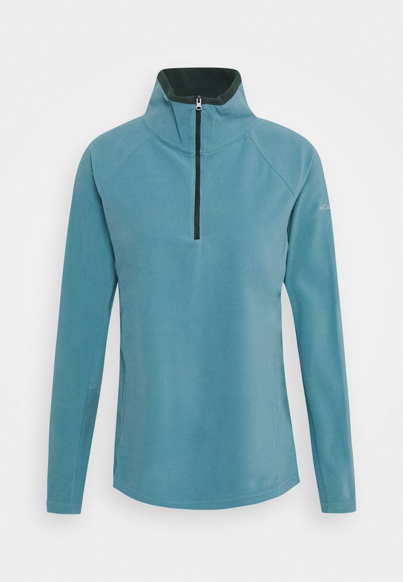 Petrolowy polar z długimi rękawami i kołnierzem z suwakiem do ćwiartki, z raglanowymi rękawami i gładką fakturą. Subtelne logo na rękawie.