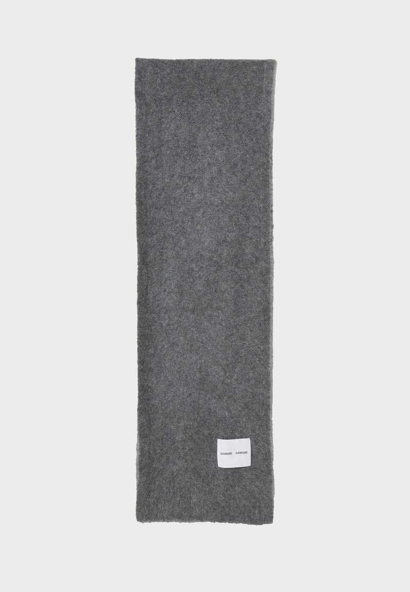 Gray scarf made of soft material, with a simple rectangular shape. Features a white label sewn at one end.