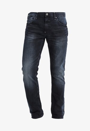 Tmavě modré denimové džíny s rovnýcm střihem, vybavené zipem, pěti kapsami a jemným vyblednutím na nohavicích pro texturu.