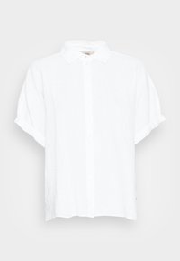 Vit kortärmad skjorta med knäppning, gjord av lättviktslinne. Har en klassisk krage och rullade manschetter, med en avslappnad passform och utan mönster.