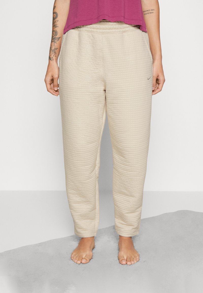 Nike Performance LUXE BOTTOM Tracksuit bottoms sanddrift/white