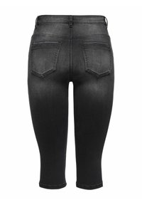 Shorts en jean noirs taille haute avec deux poches arrière et un délavage estompé, vus de dos, coupés juste en dessous du genou.