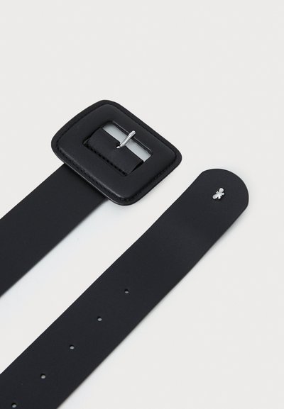 Black leather belt with a square buckle, silver metal accents, and several holes for adjustment; smooth texture and minimal design.