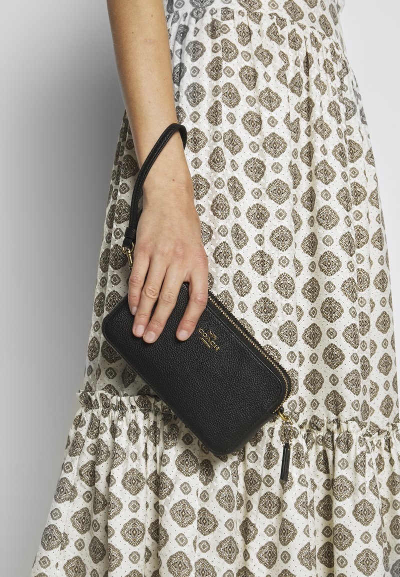 Coach POLISHED PEBBLE KIRA CROSSBODY Across body bag black Zalando.ie