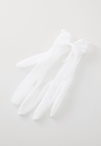 Gants en dentelle blanche avec une texture douce, présentant de longs doigts et un accent de nœud près du poignet. Design élégant et transparent.