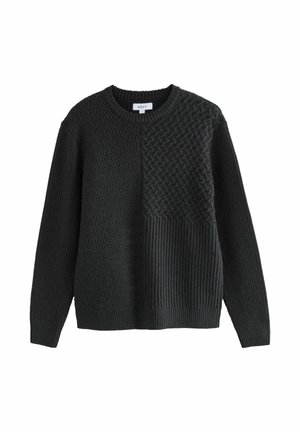 Black long-sleeve sweater with mixed knit patterns including chevron, basket weave, and ribbed textures on the front and sleeves.