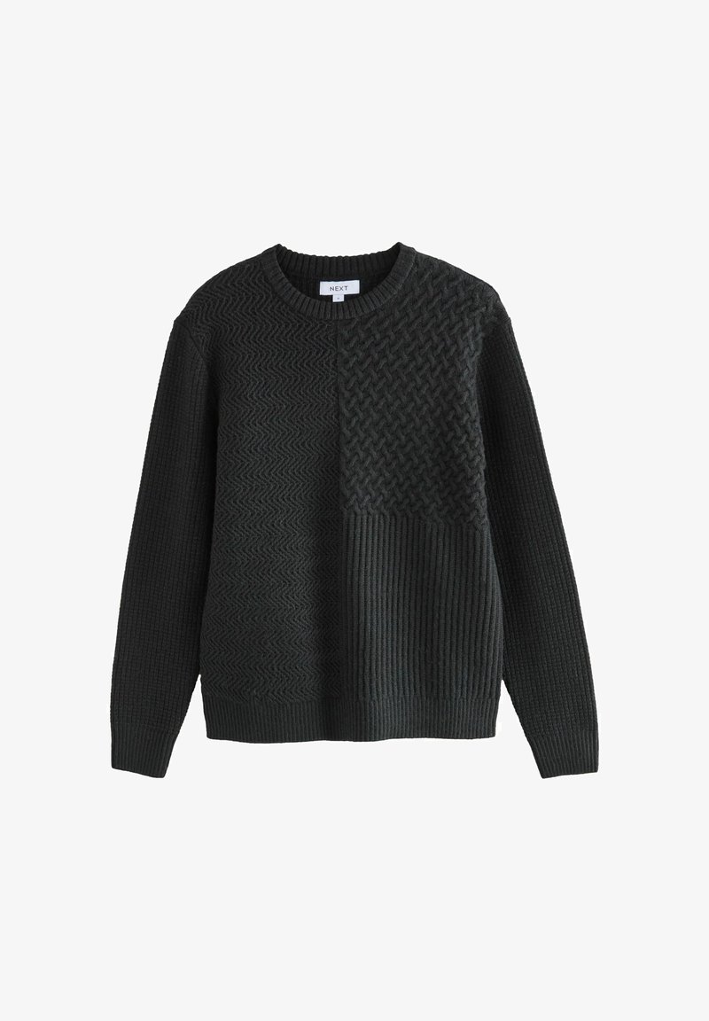 Melna garo piedurkņu džemperis ar dažādu adījuma rakstu kombināciju, tostarp chevron, groza adījuma un ribu tekstūrām uz priekšpuses un piedurknēm.