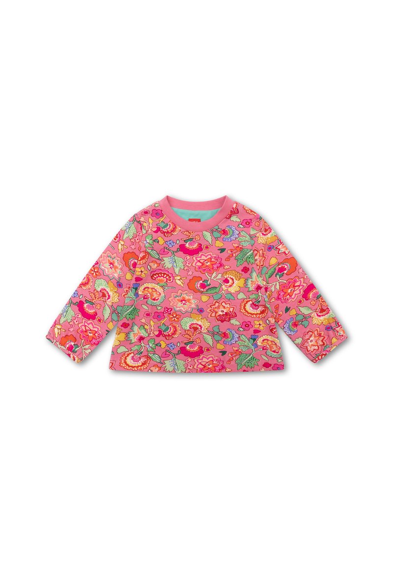 Langsleeve top in felroze stof met kleurrijke bloemmotieven, ronde hals en contrasterende turquoise binnenste kraag. Zachte textuur.