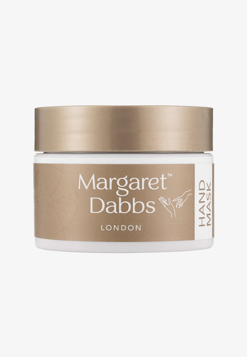 Conteneur de masque pour les mains Margaret Dabbs London avec couvercle doré et étiquette affichant le nom de la marque et une illustration de main.