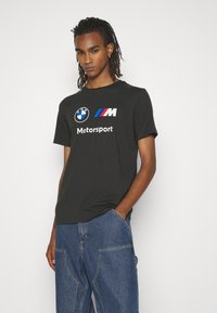 Puma LOGO TEE - Triko s potiskem - puma black