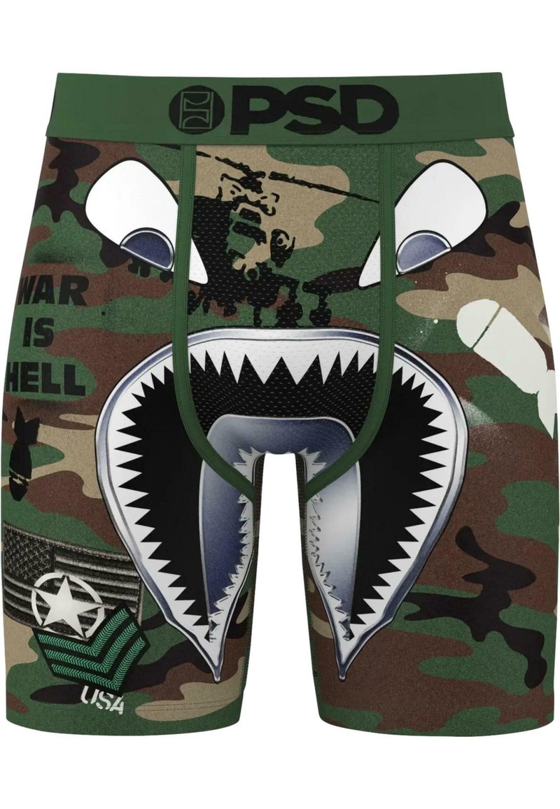 Boxers con estampado de camuflaje y un diseño gráfico de boca de tiburón, cinturilla verde y texto impreso. Fabricados con tejido elástico para mayor comodidad.