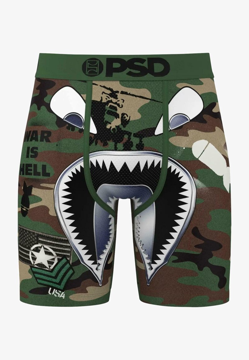 Boxers con estampado de camuflaje y un diseño gráfico de boca de tiburón, cinturilla verde y texto impreso. Fabricados con tejido elástico para mayor comodidad.