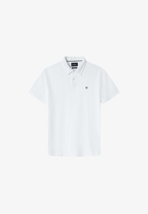 Weißes Polohemd aus Baumwolle, mit Kragen, kurzen Ärmeln und einem kleinen Marineblauen Logo auf der linken Brust. Klassische Passform und glatte Textur.