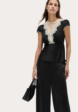 Marks & Spencer Bluse - black
