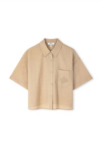 Short-sleeve, beige button-up shirt made of textured fabric featuring a chest pocket with an embroidered design.