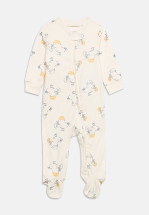 Grenouillère pour bébé couleur crème avec fermeture éclair, ornée d'illustrations ludiques de canards portant des chapeaux et tenant des boissons.