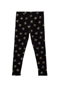 Musta leggings, joissa on toistuva kultainen nauhakuosi. Valmistettu joustavasta kankaasta, jossa on mukava joustovyötärö.