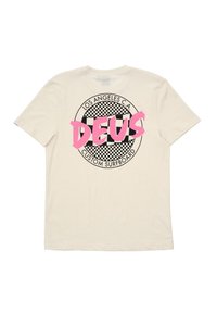 Light beige cotton t-shirt with a large black and pink graphic design on the back, featuring a checkerboard pattern and the word "DEUS."