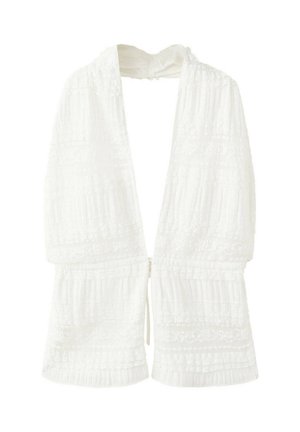 Veste blanche texturée à ouverture frontale, manches longues et coupe ample et fluide.