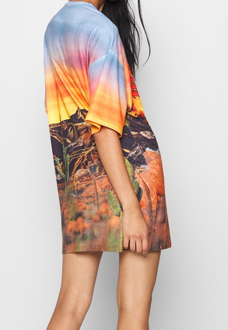 jaded london t shirt dress Zarco Asymmetric Mini Dress With Eyelets | Jaded London