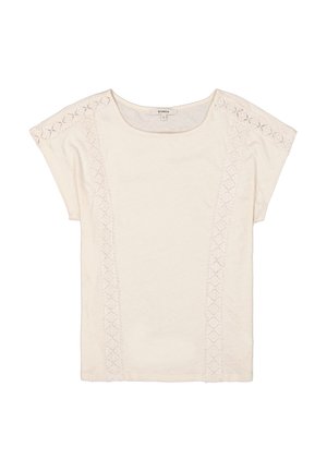 Crème-kleurige t-shirt met korte mouwen. Heeft ingewikkelde kantdetails langs de schouders en verticale naden, gemaakt van een zachte stof.
