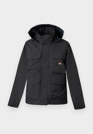 Black waterproof jacket with a hood, featuring four front pockets, a zip closure, and elastic cuffs. Smooth texture, functional design.