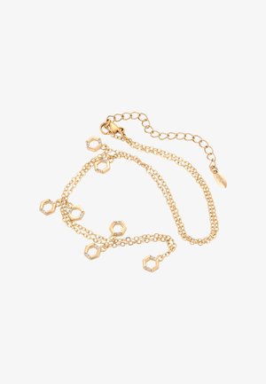 Arany lánc karkötő hatszögletű charmokkal, melyek kis kristályokkal díszítettek, állítható zárral és egy kis ovális címkével.