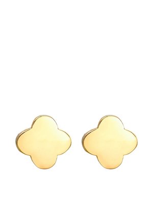 Paire de boucles d'oreilles clous en or poli en forme de trèfle à quatre feuilles avec des surfaces lisses sur fond blanc.