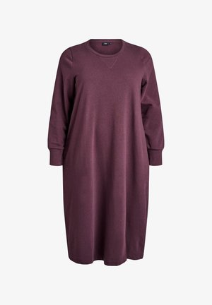 Bordo dukserica haljina izrađena od mekanog materijala. Ima duge rukave, okrugli izrez i ravnu siluetu s dužinom do sredine.
