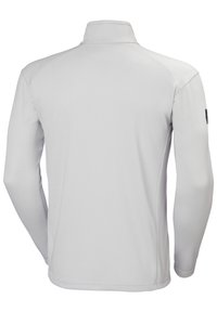Sudadera de manga larga con cuello en tejido gris claro. Textura suave con un diseño ajustado y sin logos ni patrones visibles en la parte posterior.