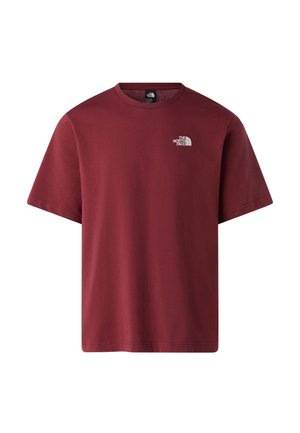 T-shirt a girocollo color marrone, maniche corte, realizzata in cotone con un piccolo logo bianco sul lato sinistro del petto, tessuto liscio, vestibilità casual.