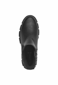 Bottines noires en cuir lisse, avec un bout rond et une fermeture éclair sur le côté. La semelle robuste a des motifs proéminents pour une meilleure adhérence.
