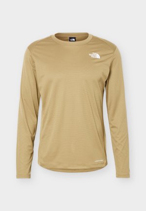 Šviesiai ruda ilgomis rankovėmis marškinėliai su apvalia apykakle, mažas baltas The North Face logotipas ant krūtinės ir užrašas "Light Range" prie apačios.