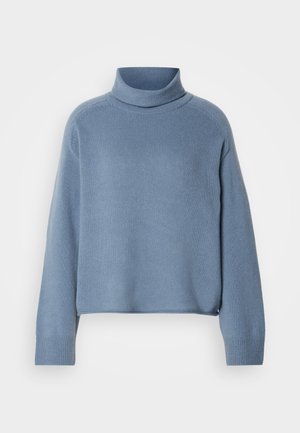 Maglione a collo alto blu realizzato in materiale lavorato a maglia, caratterizzato da maniche lunghe e polsini a costine. Design corto con una vestibilità rilassata.