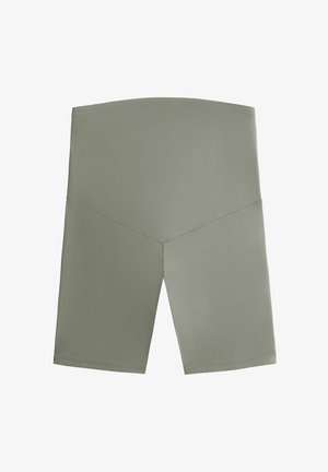 Vysoké zelené cyklistické šortky vyrobené z elastického materiálu s hladkou textúrou, s geometrickým dizajnom na prednom paneli.