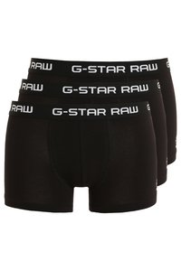 Boxer briefs neri in confezione da tre, con il logo bianco "G-STAR RAW" sull'elastico in vita. Materiale morbido ed elasticizzato con un design aderente.