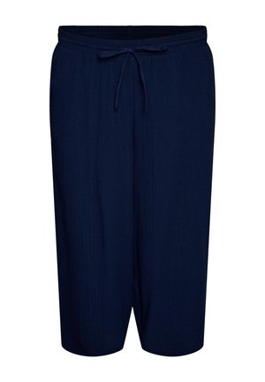 Mørkeblå knælange løse bukser med elastisk linning og justerbar snor, lavet af let tekstureret stof.