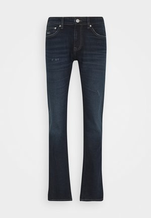 Dunkelblaue Bootcut-Denim-Jeans mit leichter Verfärbung und subtilen Gebrauchsspuren vorne, mit fünf Taschen und einem Metallknopfverschluss.