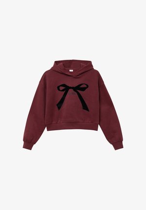 Kastanienbrauner, kurz geschnittener Hoodie aus weichem Stoff mit einem schwarzen Samtschleifen-Design auf der Vorderseite und einer Kapuze mit Kordelzug. Mit elastischen Bündchen.
