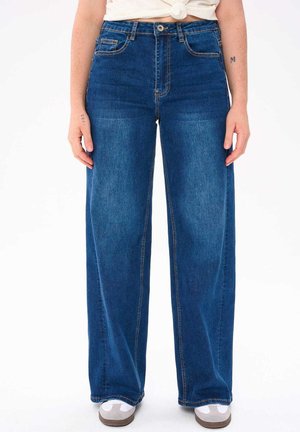 - Jeansy Relaxed Fit