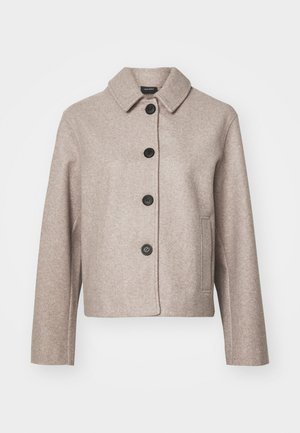 Veste courte en laine beige mélangée avec un col, cinq boutons noirs et poches latérales, à tissu texturé.